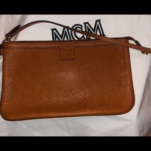 MCM caramel colored shoulder bag.